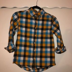 A boys button down shirt
